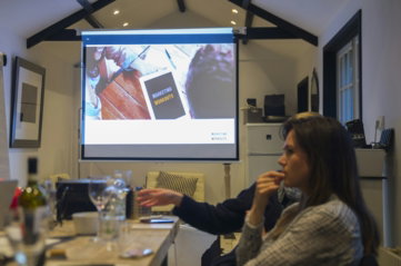 three-person-s-facing-on-desk-near-projection-screen.jpg three person's facing on desk near projection screen